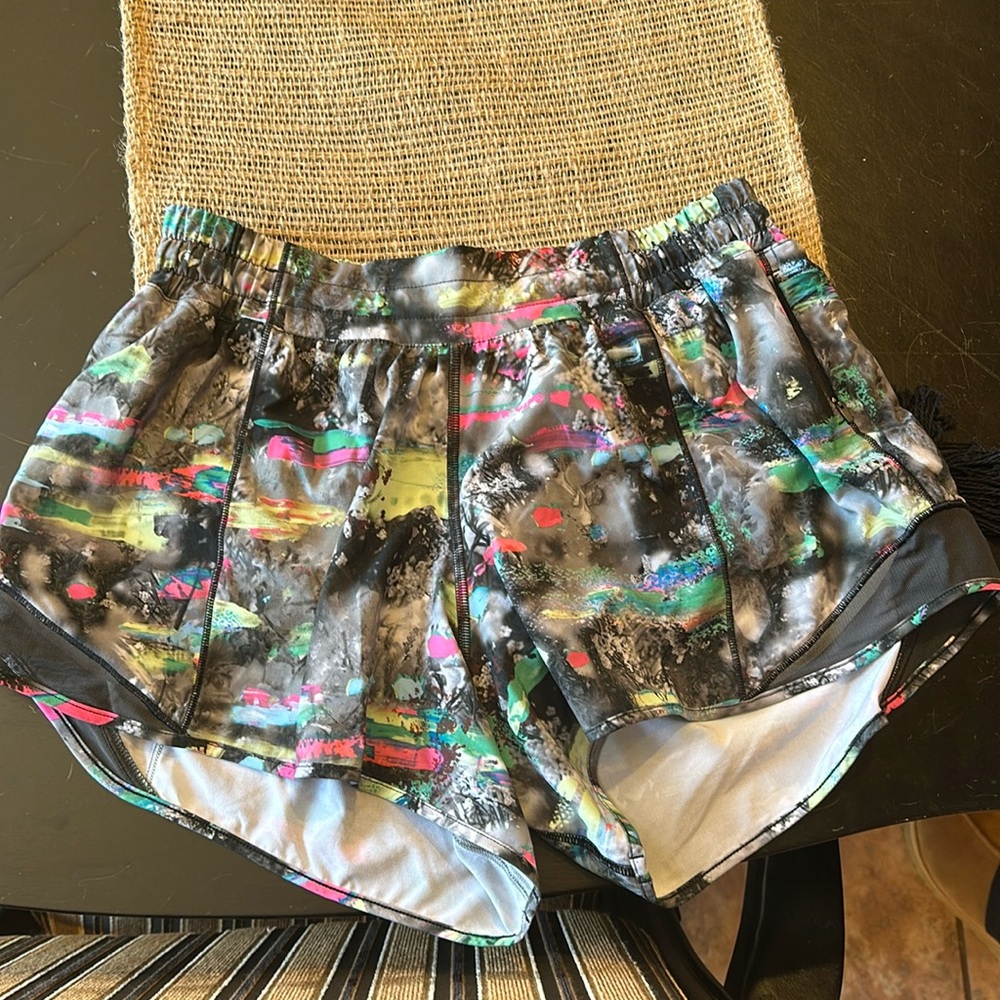 Lululemon hotty hot shorts size 8   4 inch inseam mid to low rise. Multi color